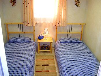 Schlafzimmer mit 2 Einzelbetten